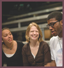 three students laughing together